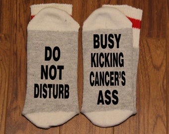 Do Not Disturb ... Busy Kicking Cancer's Ass (Word Socks - Funny Socks - Novelty Socks)