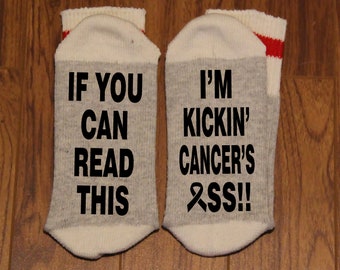 If You Can Read This ... I'm Kickin' Cancer's Ass!!  (Word Socks - Funny Socks - Novelty Socks) - with the "A" in Ass replaced with a Ribbon