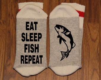 Eat Sleep Fish Repeat ... (Silhouette of a Fish) (Word Socks - Funny Socks - Novelty Socks)