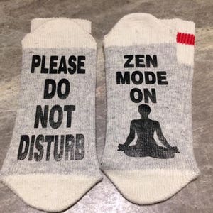 Please Do Not Disturb ... Zen Mode On (Word Socks - Funny Socks - Novelty Socks) with silhouette of a person meditat