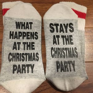 What Happens At The Christmas Party ... Stays At The Christmas Party (Word Socks - Funny Socks - Novelty Socks)