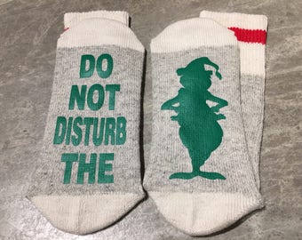 Do Not Disturb ... The Grinch (Word Socks - Funny Socks - Novelty Socks) with a silhouette of The Grinch