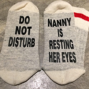 Do Not Disturb ... Nanny Is Resting Her Eyes (Word Socks - Funny Socks - Novelty Socks)