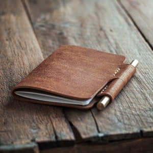 Handmade leather journal. Leather notebook cover. Leather sketchbook cover with a pen holder. Vegetable tanned leather from Italy. Handmade in Finland.