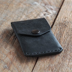 Black leather wallet handmade in Finland with vegetable tanned leather. A card holder or a coin pouch with button. Italian full grain leather. Handmade leather wallet for men. Gift for him. wallet for woman. gift for her