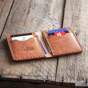 Luava handmade leather bifold wallet cognac in use