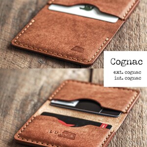 Handmade cognac brown leather bi-fold wallet for men and women. Mens card wallet made with vegetable-tanned full-grain leather. Compact and slim leather wallet.