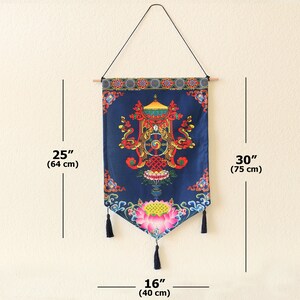 May include: A blue tapestry with a colorful mandala design, featuring a lotus flower, and tassels. The tapestry is 30 inches tall and 16 inches wide.