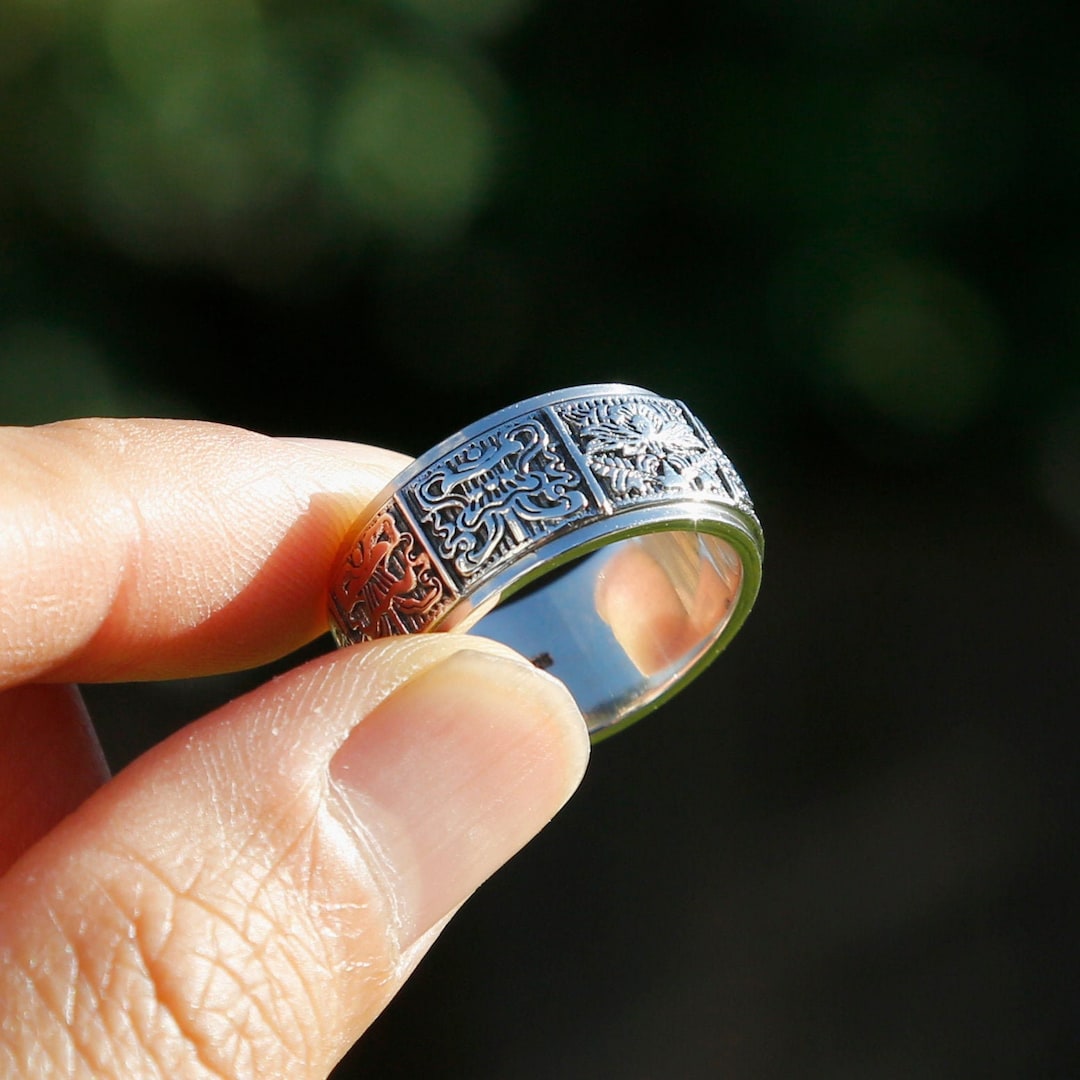 Embossed Tibetan Ashtamangala Sterling Silver Spinner Ring