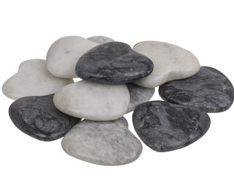 Pair of heart-shaped pebble stones for lovers