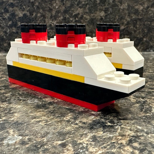 Disney Cruise Line Lego® Ship - Fish Extender (FE) w/ gift bag by TheRomanwanderlust. Free standard shipping on orders 35+ USD! **In Stock**
