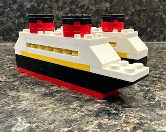 Disney Cruise Line Lego® Ship - Fish Extender (FE) w/ gift bag by TheRomanwanderlust. Free standard shipping on orders 35+ USD! **In stock**