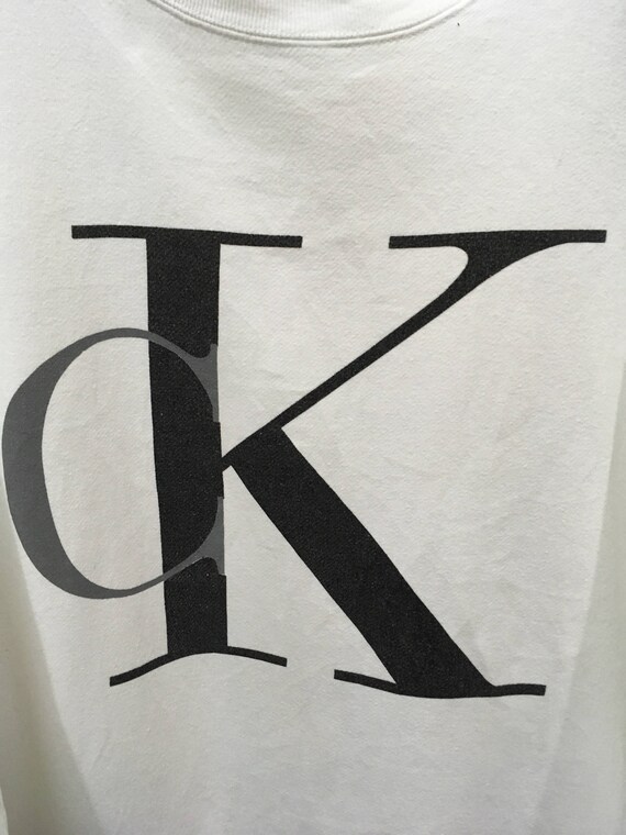 white ck jumper