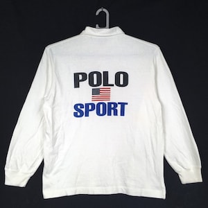 Polo de rugby Ralph Lauren de los años 90, con letras deletreadas, logo grande, manga larga, bloques de color, talla M, estilo vintage.