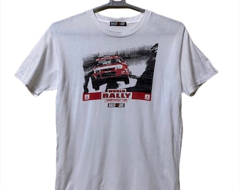 May include: White t-shirt with a red Mitsubishi Lancer Evolution rally car graphic. The text "World Rally Championship Team Rally Art" is printed below the car.