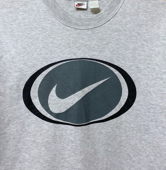 Nike logo 90s outlet