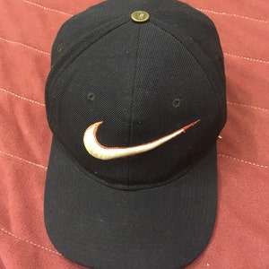 black and gold nike hat