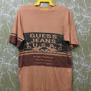Vintage anni &#39;90 Guess jeans usa grande logo t-shirt colore arancione taglia M