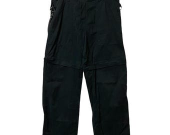 Pantalones bondage Aglomania de Vivienne Westwood, fabricados en Italia. Color negro. Talla 48.