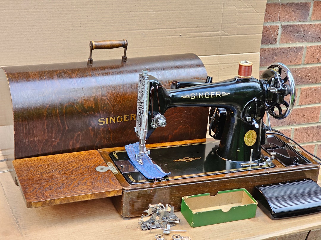 Sold at Auction: A Singer Sewing Machine in a Case, model no. 201P