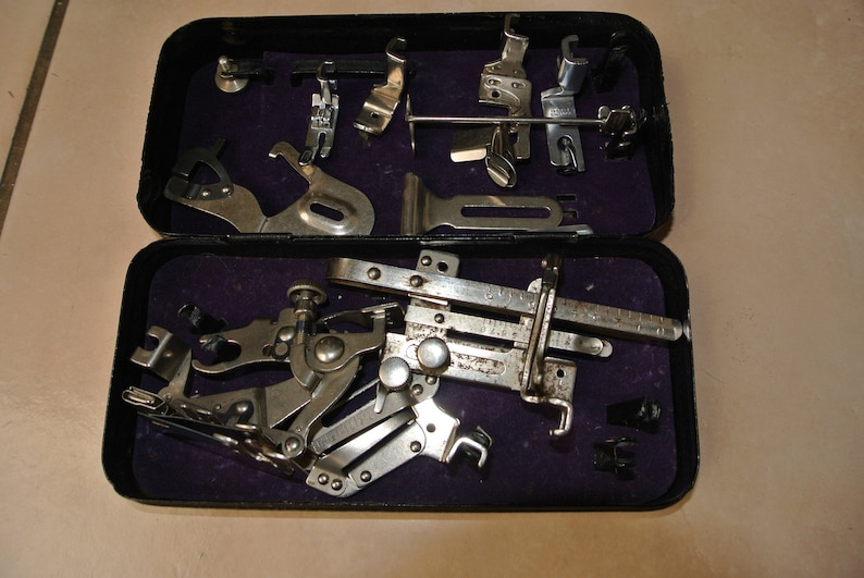 12 Singer Sewing Machine Box with attachments