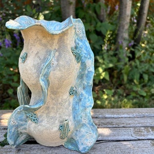 Coastal centerpiece, textured pottery, sand and sea