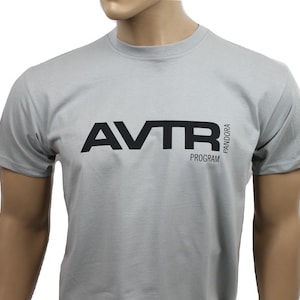May include: A grey t-shirt with a black graphic that says "AVTR PROGRAM PANDORA" on the front.