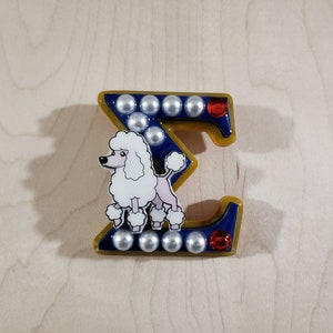 Rubies, Pearls, and Poodle Sigma Pin.