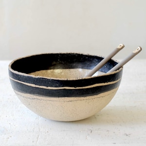 Black and white rough clay ceramic bowl