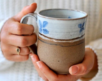 pottery mug with blue flowers