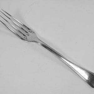 May include: A silver fork with a simple, elegant design. The fork has a long, slender handle and four tines.