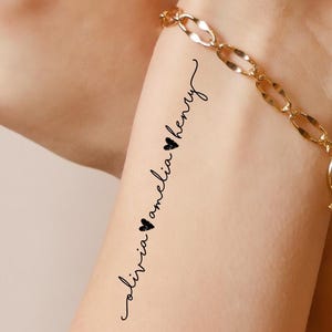 May include: A set of three ceramic mugs with a speckled, matte finish in cream, light grey, and dark grey. Each mug has a simple, minimalist design, suitable for coffee or tea.