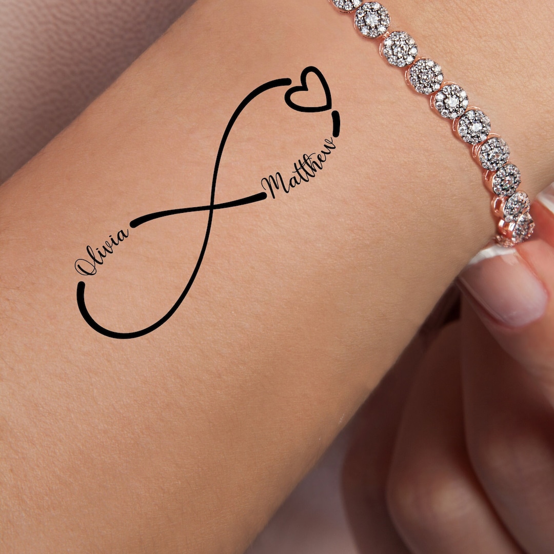 Girly Wrist Tattoos With Names to Love