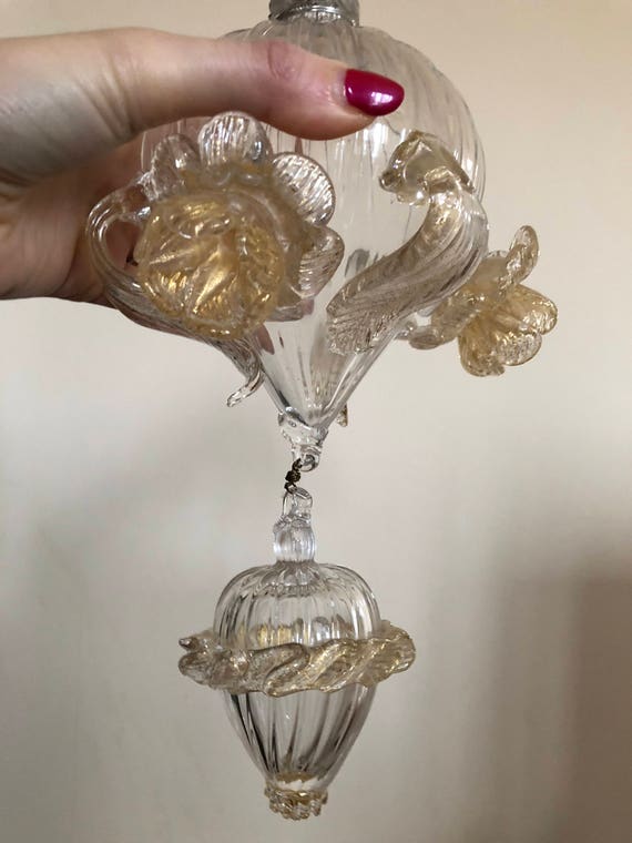 Fiocco e finale pendenti, ricambi per lampadari di Venini con pezzi rotti ,  in vetro soffiato di Murano, color oro e trasparente -  Italia