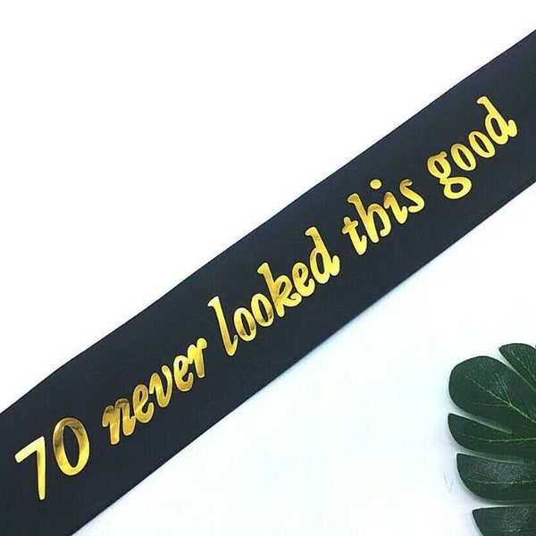 70 never looked this good sash 70th birthday black with metallic gold writing party supplies favours milestone