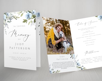 May include: A blue and green floral memorial card with a photo of a woman and her dog. The card includes the text "In Loving Memory of Judy Patterson" and the dates "10.18.35 - 09.02.19". The card also includes the text "Saturday, 09.10.19, at 3:30pm Service to be held at Liberty Memorial".
