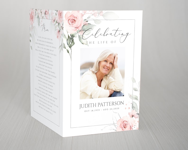 May include: A white memorial card with a floral design featuring pink roses and green leaves. The card includes a photo of a woman, the text "Celebrating the Life of", and the name "Judith Patterson" with dates "Oct 18, 1935 - Aug 24, 2020".