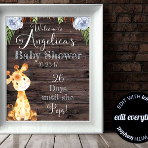 May include: A printable baby shower countdown sign with a giraffe illustration, blue flowers, and the text "Welcome to Angelicas Baby Shower 10-23-17 26 Days until she Pops!"