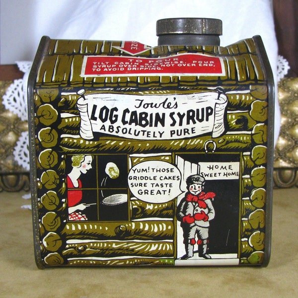 small Size TOWLE'S LOG CABIN Syrup tin, Cartoon scenes, Pancake syrup tin, Log Cabin Syrup Division, Boy dressed for Snow