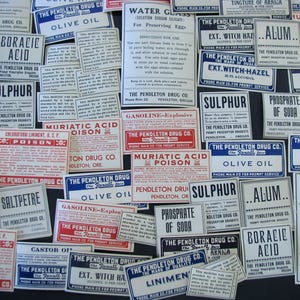 May include: A collection of vintage pharmacy labels from The Pendleton Drug Co. in various sizes and shapes. The labels feature text such as "Olive Oil", "Sulphur", and "Muriatic Acid Poison" in black and red ink.