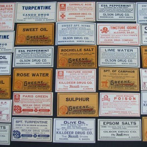 May include: A collection of vintage medicine labels, featuring various names like "Turpentine," "Castor Oil," and "Epsom Salts." The labels are rectangular with text in black and red, set against white and tan backgrounds. The labels are from various drug companies.