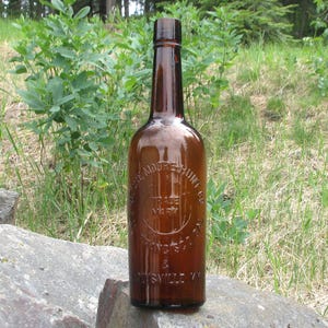 old JESSE MOORE liquor bottle, Western whiskey Bottle, San Francisco, LOUISVILLE bottle, old Wild West bottle, Basement Bar Decor
