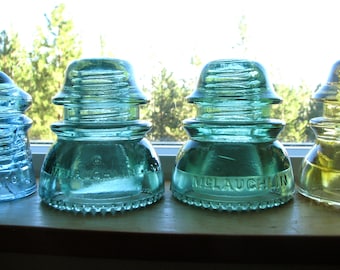 2 dif GREENISH McLAUGHLIN 42 glass insulators, McLaughlin Glass Co, Vernon California, CD 154 styles, telegraph, telephone