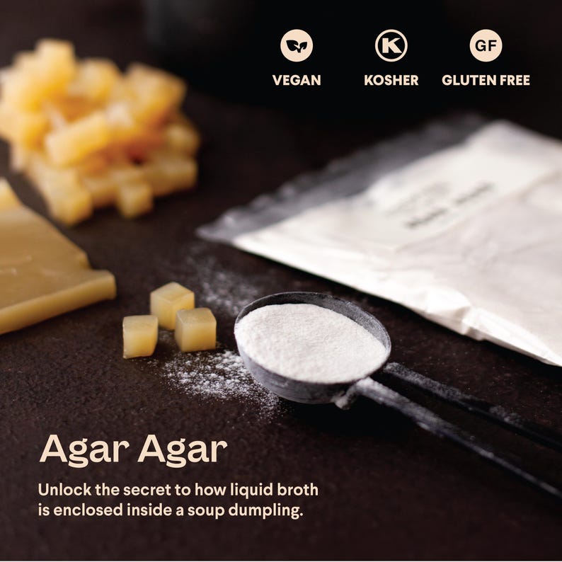 May include: A white powder labeled "Agar Agar" in a clear plastic bag. The powder is also in a small measuring cup. The text "Unlock the secret to how liquid broth is enclosed inside a soup dumpling." is below the product name. The product is labeled as vegan, kosher, and gluten free.