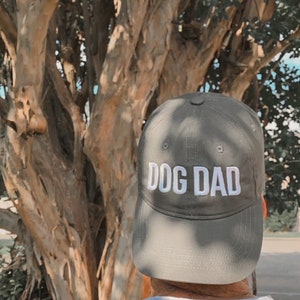 Dog Dad Hat in olive on model