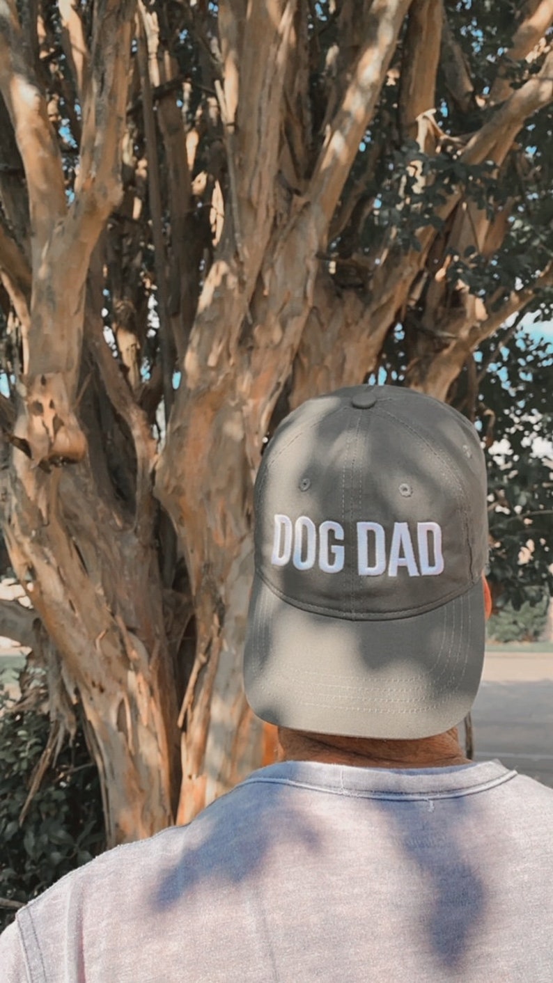 Dog Dad Hat in olive on model