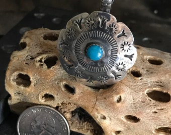 Kingman deep blue turquoise cabochon set in a  sterling silver pendant