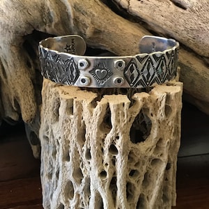 Heavy duty 14 ga. sterling silver cuff bracelet in southwestern style. Made in the USA.Handmade & hand stamped