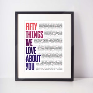 May include: Framed art print with the text "FIFTY THINGS WE LOVE ABOUT YOU" in a colorful, gradient design. The print includes a list of loving sentiments in a white font against a dark background.