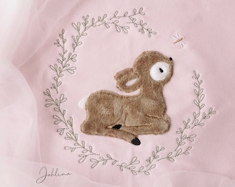 Embroidery file Lying deer in a wreath of leaves 16x26